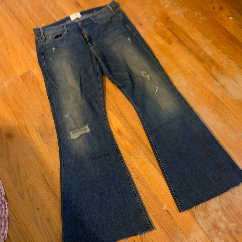 Distressed bell bottom jeans